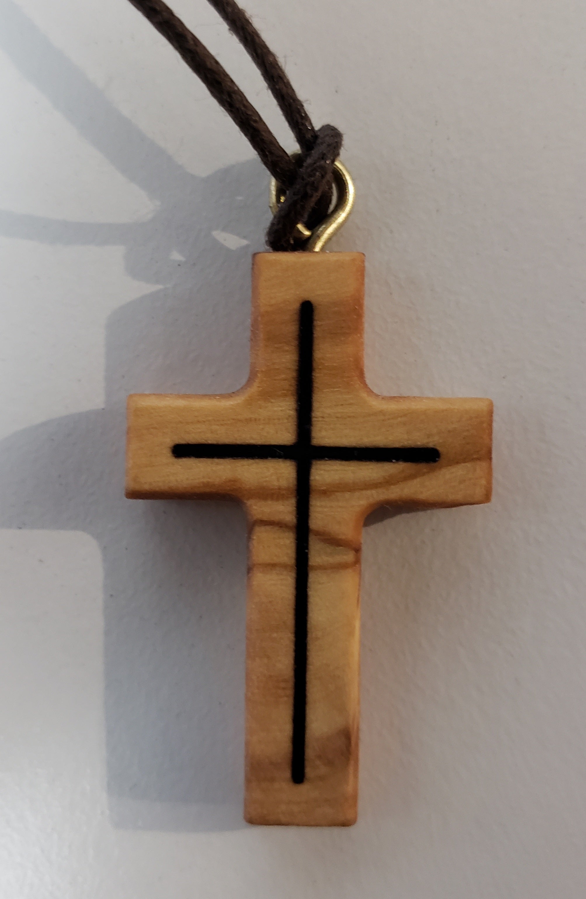 OLIVE WOOD 3.2CM CROSS IN CROSS ON CORD