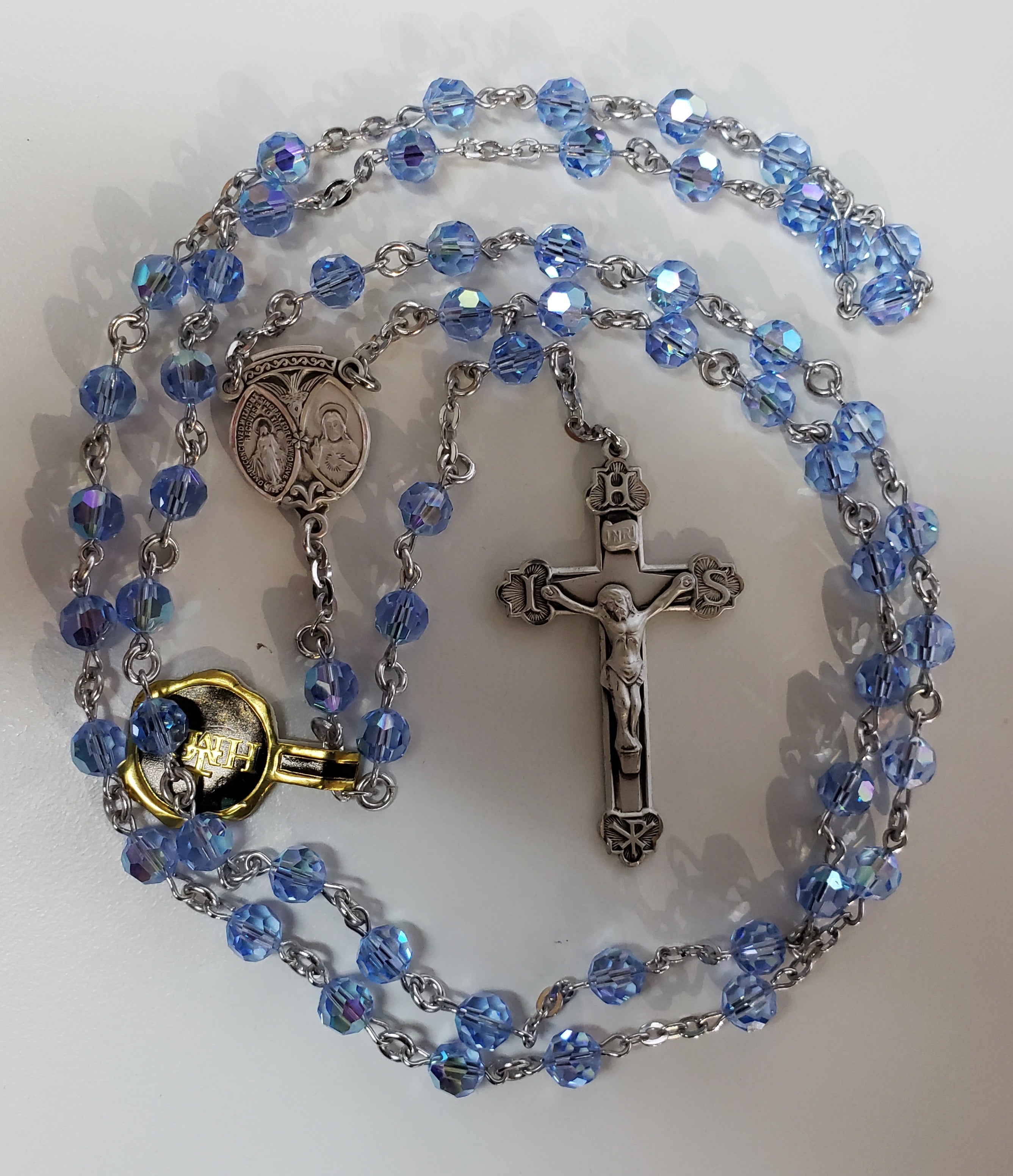 6mm Swarovski Crystal Light Sapphire Rosary w/Sterling Silver Ctr & Ctx