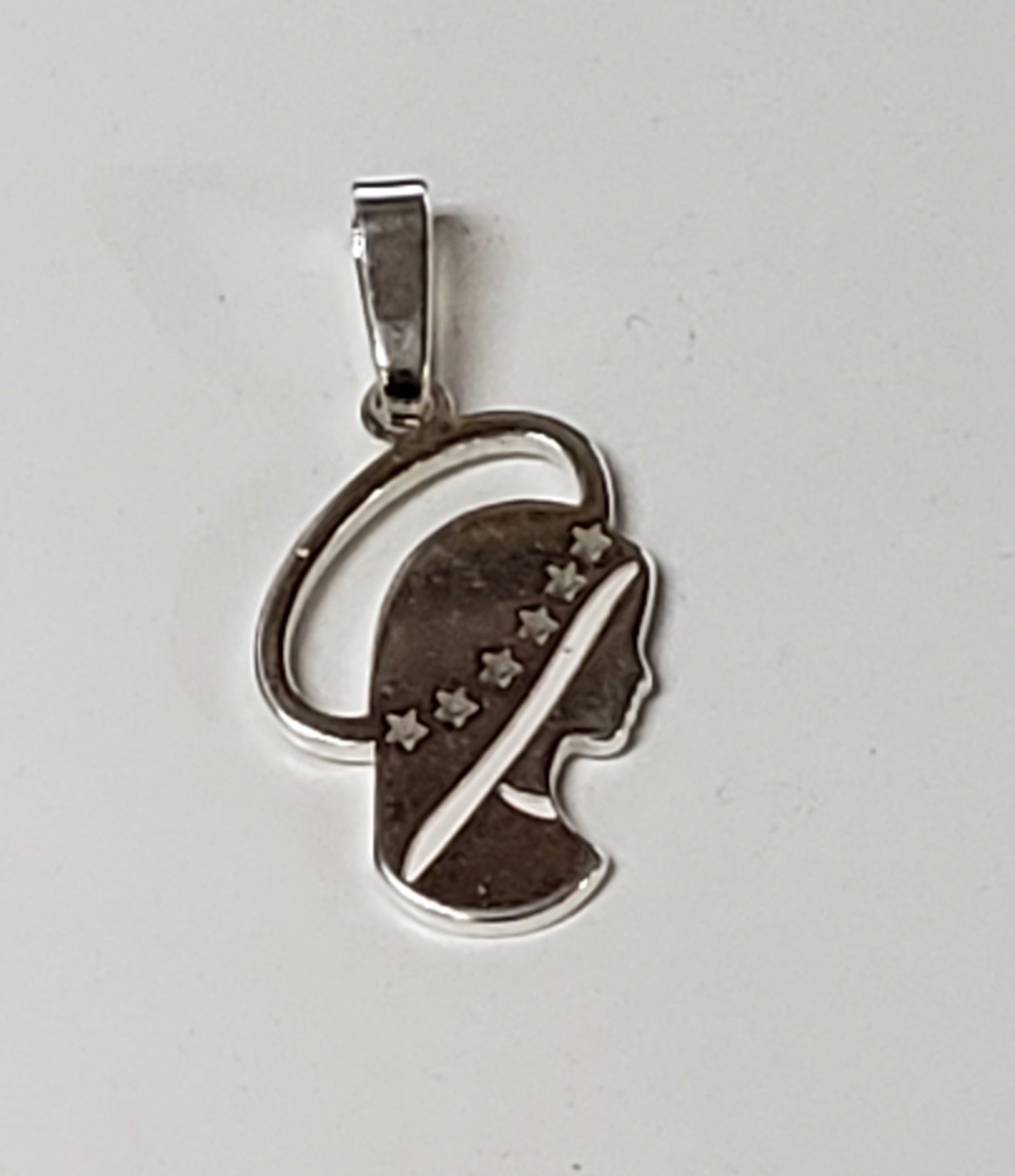 Virgin Mary silhouette silver pendant